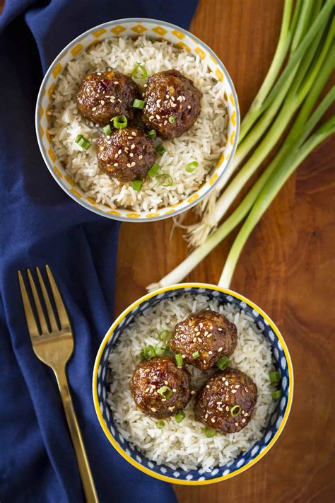 sweet-and-spicy-crockpot-asian-sausage-meatballs image