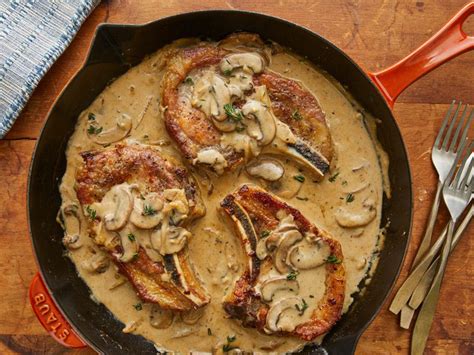smothered-pork-chops-recipes-southern-living image