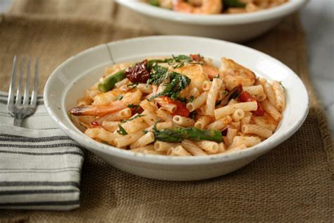 easy-shrimp-pasta-salad-recipe-with-asparagus-tomatoes image