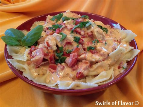 creamy-chicken-pasta-recipe-with-tomatoes-and-basil image
