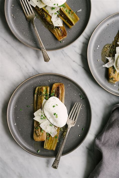 braised-leeks-with-poached-eggs-our-salty-kitchen image