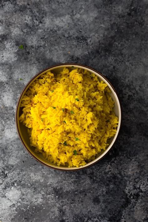 turmeric-yellow-rice-sweet-peas-and-saffron image