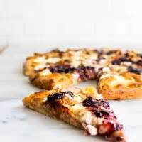 white-pizza-with-pulled-pork-and-balsamic-blackberry image