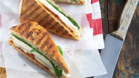 turkey-paninis-with-sun-dried-tomatoes-clean-eating image