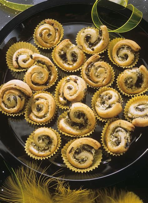 olive-and-feta-puff-pastry-pinwheels-recipe-eat image