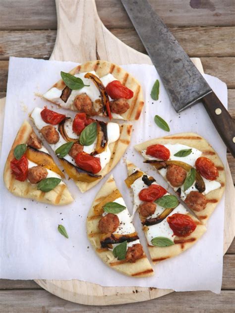 grilled-pizzas-with-sausage-peppers-roasted-tomatoes image