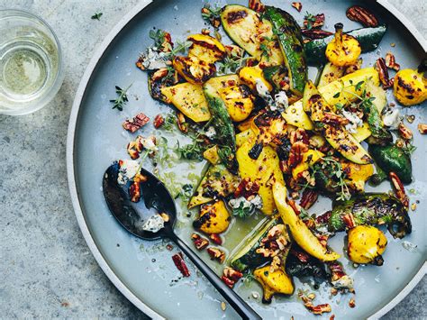 grilled-summer-squash-with-blue-cheese-and-pecans-food-wine image