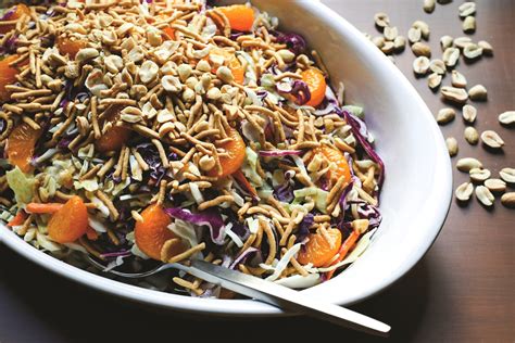 asian-coleslaw-recipe-with-spicy-peanut-dressing image