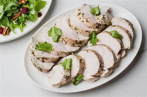 perfectly-poached-chicken-breasts-recipe-the-spruce image