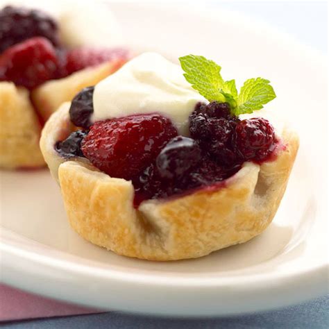 mixed-berry-tartlets-better-homes-gardens image