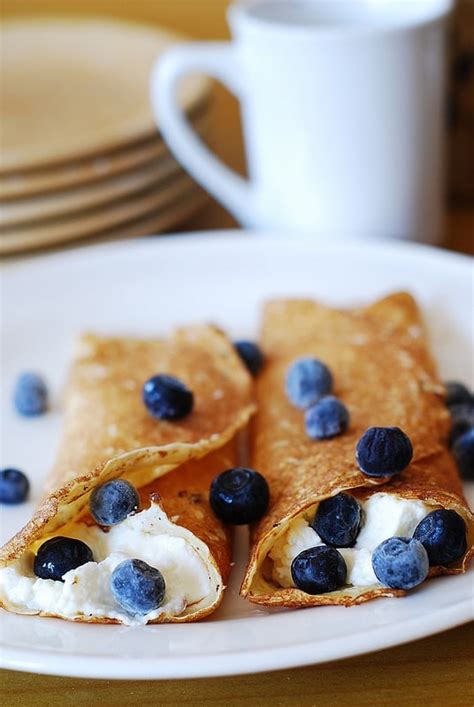 stuffed-crepes-with-ricotta-cheese-and-blueberry-filling image