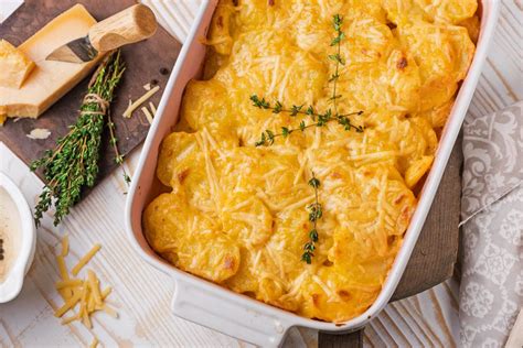 cheddar-cheese-scalloped-potatoes-recipe-the-spruce image