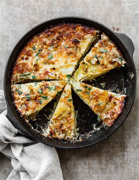 french-potato-cake-with-leeks-and-cheese-familystyle image