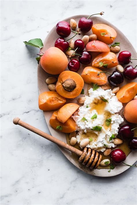 stone-fruit-honey-soft-cheese-plate-ful-filled image