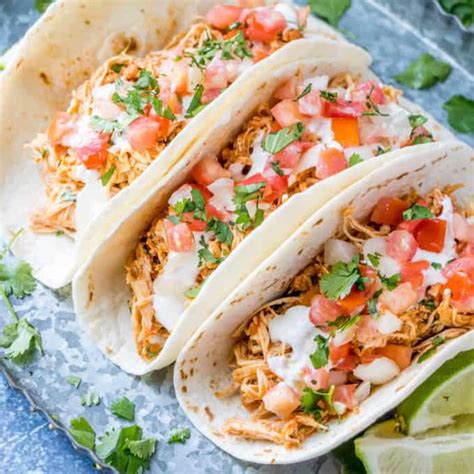 slow-cooker-cilantro-lime-chicken-tacos-belle-of-the image