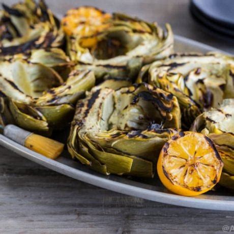 grilled-artichokes-step-by-step-with-lemon-butter-sauce image