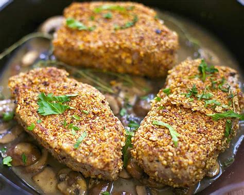 almond-crusted-pork-chops-with-mushroom-garlic-sauce image