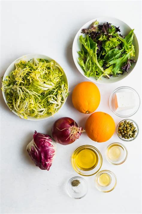 orange-frisee-salad-recipe-the-delicious-spoon image