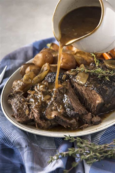 easy-all-day-crock-pot-chuck-roast-the-crumby image
