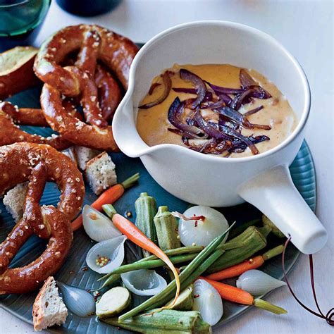 gouda-pancetta-and-onion-fondue-with-pretzels image