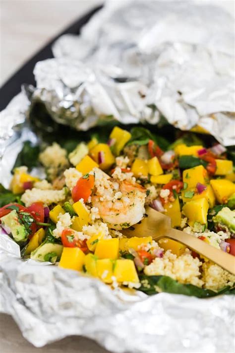 shrimp-couscous-packets-with-avocado-mango-salsa image