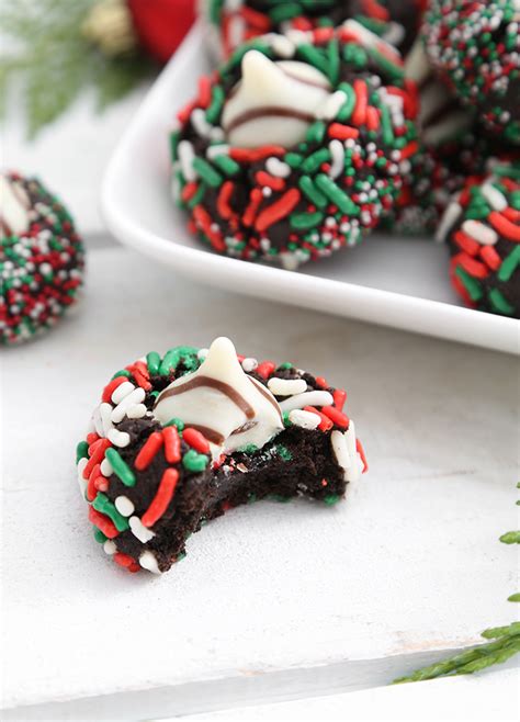 christmas-kiss-cookies-sprinkle-bakes image