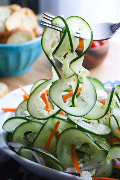 sweet-and-tangy-cucumber-ribbon-salad-grab-a-plate image