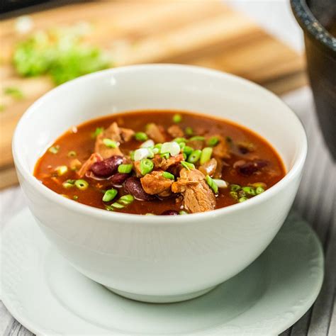 hearty-pork-and-bean-stew-so-delicious image