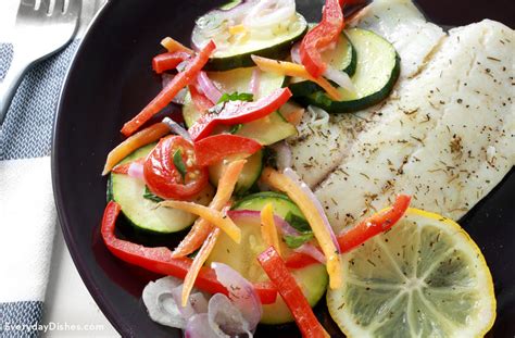 baked-tilapia-and-veggies-recipe-everyday-dishes image