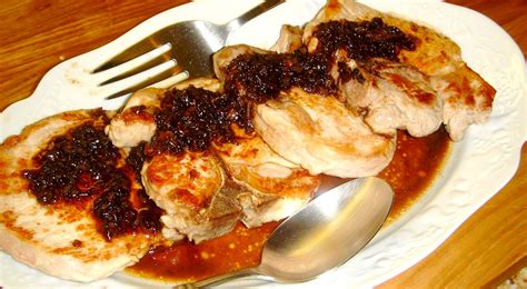 pork-chops-with-balsamic-orange-honey-shallot-sauce image