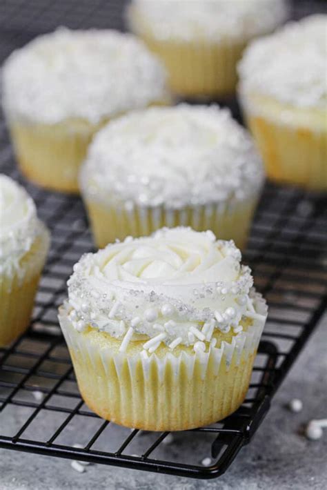fluffy-moist-cupcakes-topped-with-almond-frosting image