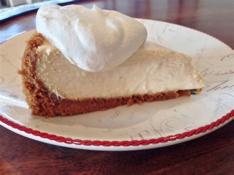eggnog-cheesecake-with-rum-whipped-cream-live image