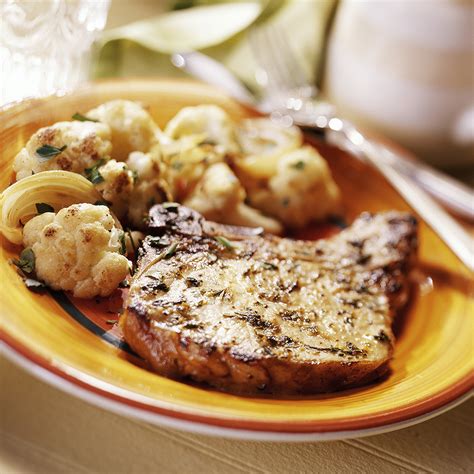 pork-chops-with-roasted-cauliflower-and-onions image