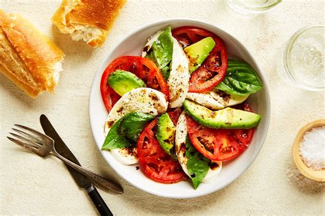 avocado-tomato-and-mozzarella-caprese-salad image