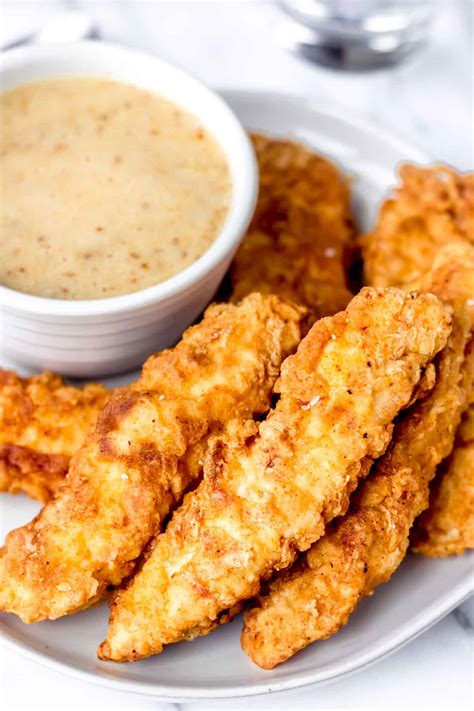 crispy-pan-fried-chicken-tenders-delicious-little-bites image