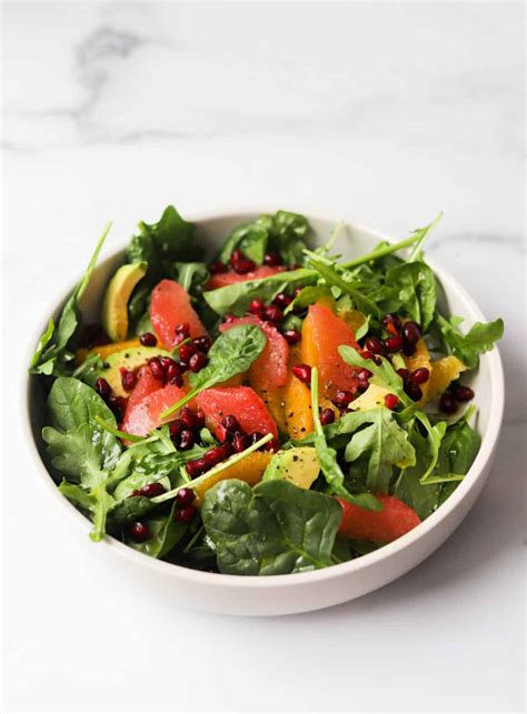 citrus-arugula-salad-with-pomegranate-dressing image