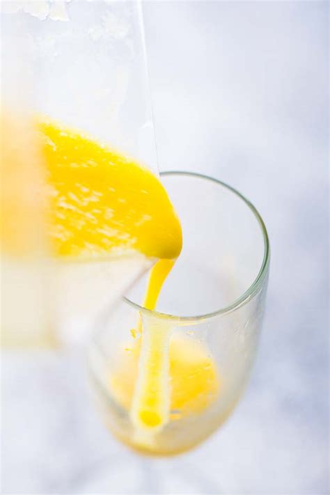 sunrise-mimosa-recipe-gorgeous-mango-cocktail image
