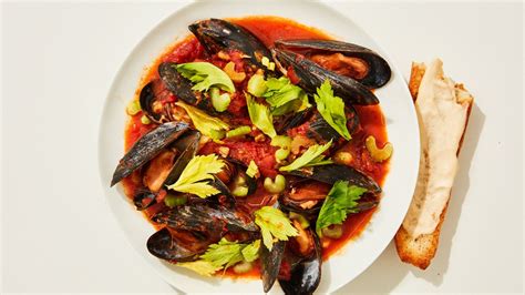 mussels-in-spicy-tomato-broth-recipe-bon-apptit image