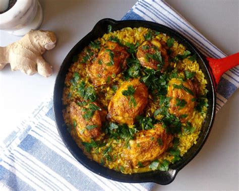 one-skillet-ginger-turmeric-chicken-thighs-with-rice image