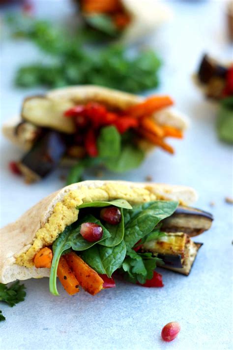 pita-pockets-with-roasted-veggies-and-hummus-happy image