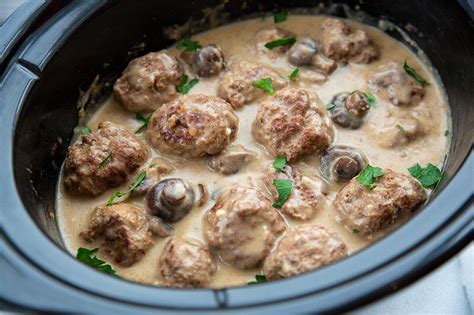 crock-pot-meatballs-with-creamy-mushroom-gravy image