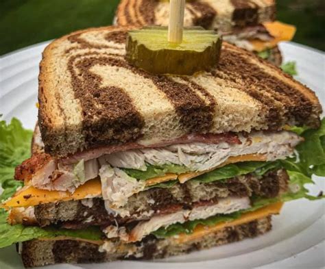 grilled-turkey-bacon-and-avocado-club-sandwich image