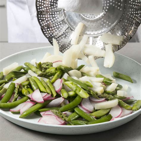 buttery-spring-vegetables-cooks-illustrated image