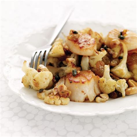 seared-scallops-with-cauliflower-capers-and-raisins image