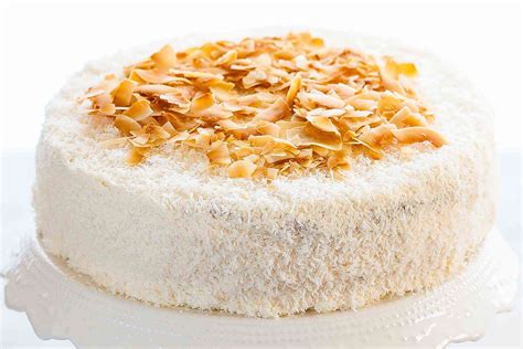 coconut-cake-with-lemon-curd-and-vanilla-buttercream image