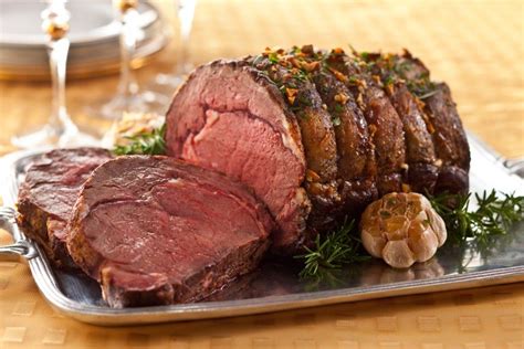 perfect-prime-rib-with-rosemary-and-roasted-garlic image