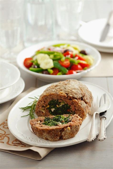 spinach-feta-and-pine-nut-filled-meatloaf-recipe-eat image
