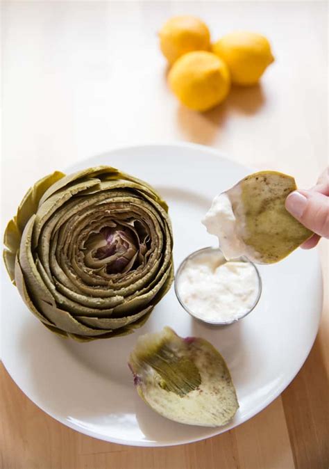 instant-pot-artichokes-with-lemon-garlic-aioli-tastes image