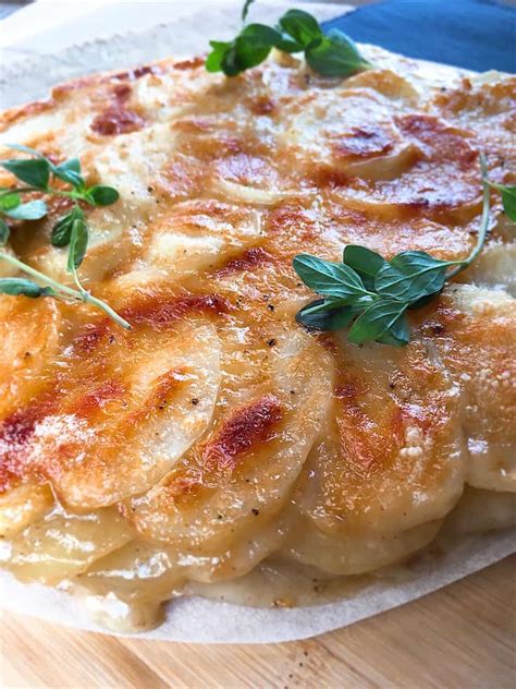 scalloped-potatoes-with-ham-provolone-cheese image