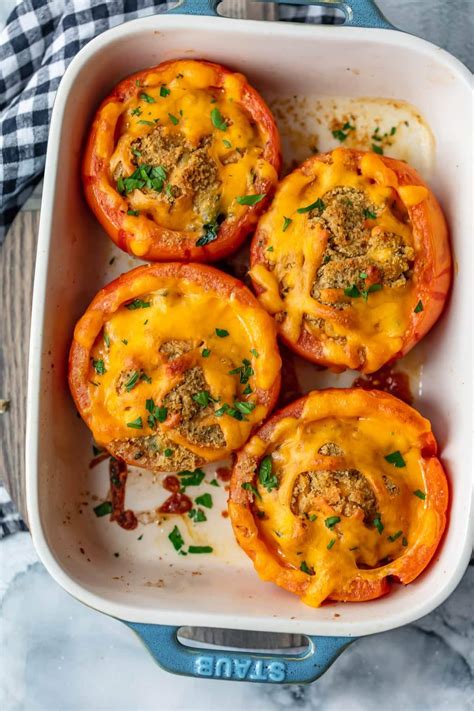 cheesy-stuffed-tomatoes-recipe-with-zucchini-spinach image